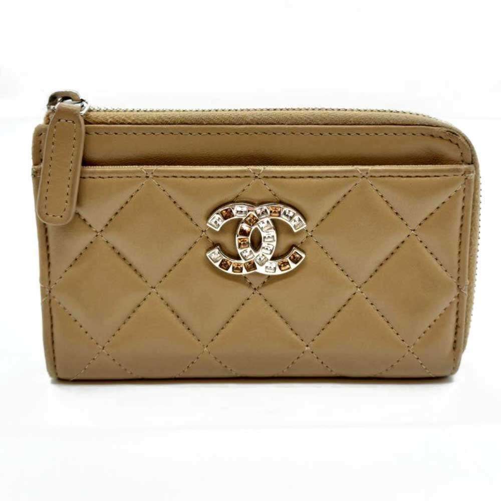CHANEL Brown Lambskin Leather Logo Mini Bag